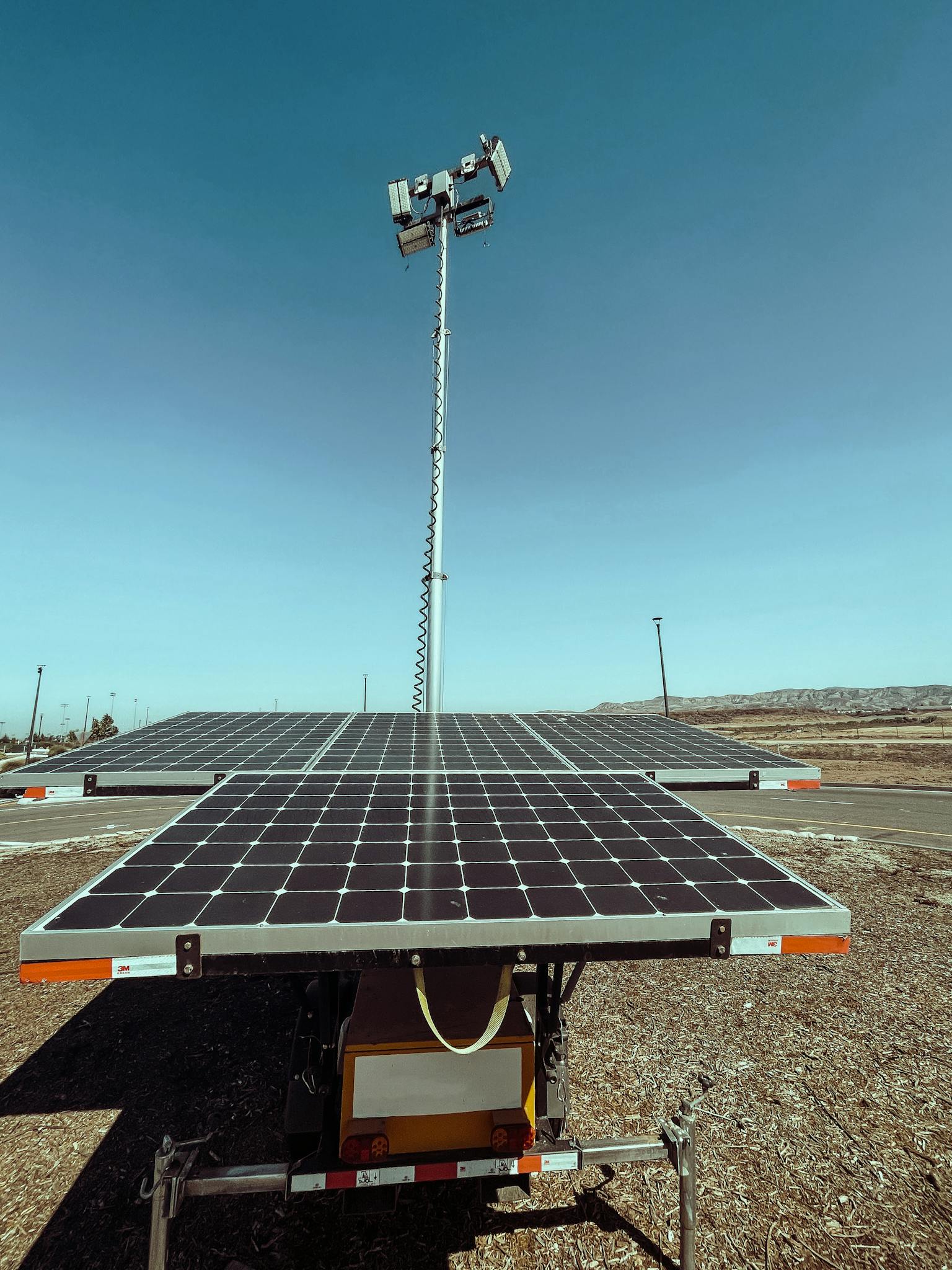 Renewable energy solar panels in a sunny California landscape, highlighting sustainable power.